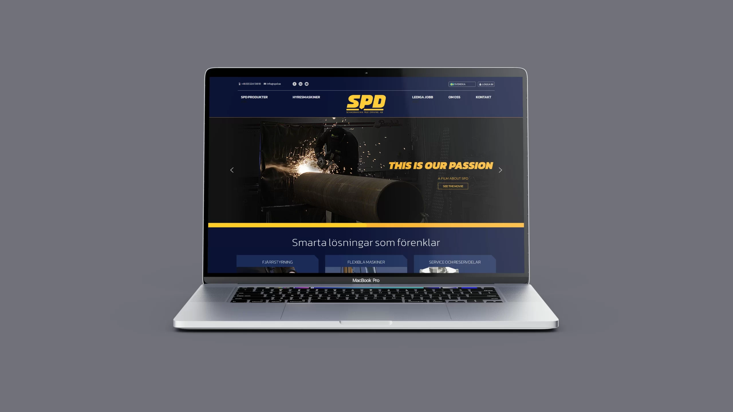 En bärbar dator med Scandinavian Pile Driving ABs webbplats på skärmen.